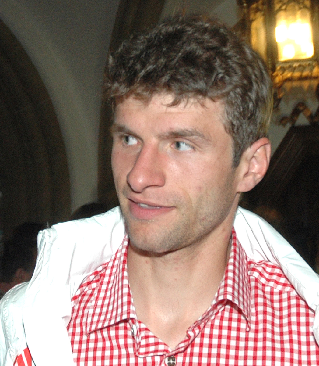 Thomas Müller bei der "Triple-Feier" im Münchner Rathaus 2013