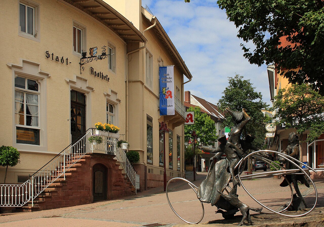 Stadtapotheke (City Pharmacy) in Wiesloch, Baden-Württemberg, Germany, the first filling station in the world.  A Bertha Benz memorial is in the foreground.