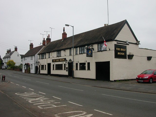 Wolston Cottages and The Half Moon Public House, one of three pubs in the village.