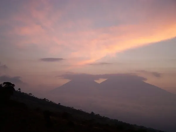 Sunset behind Acatenango and Fuego, seen from the lower north side of Volcan de Agua.