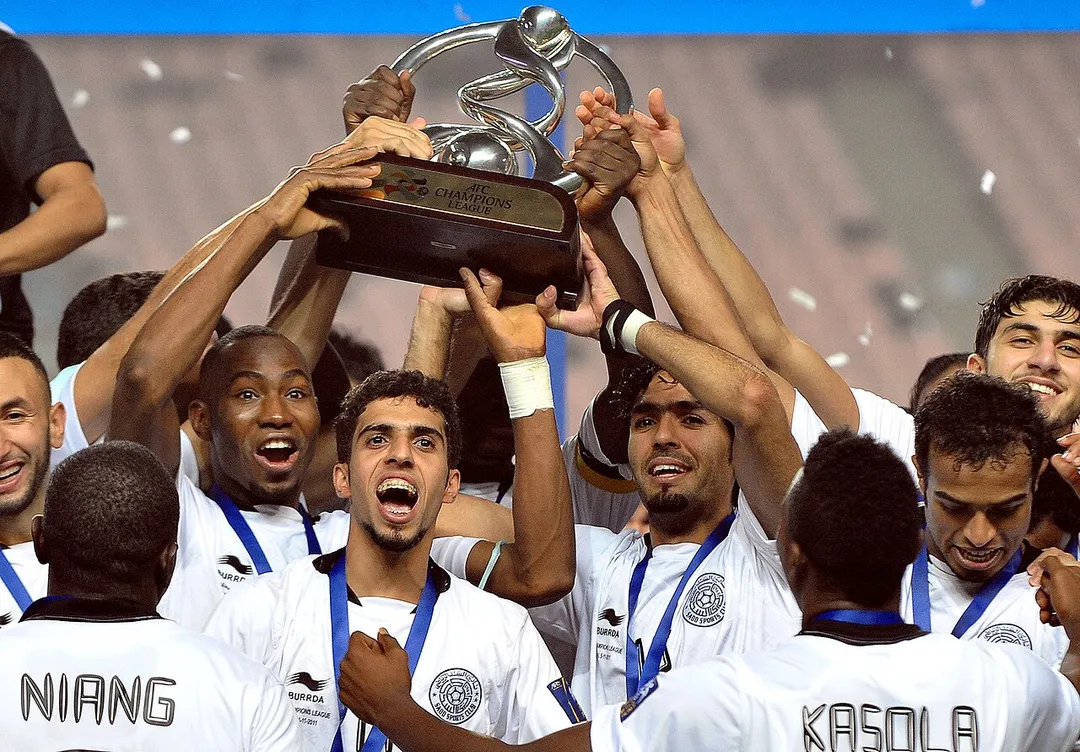 Members of the Al Sadd team celebrates after winning the AFC CHampions League trophy.
Pic by Doha Stadium Plus

http://www.dohastadiumplusqatar.com