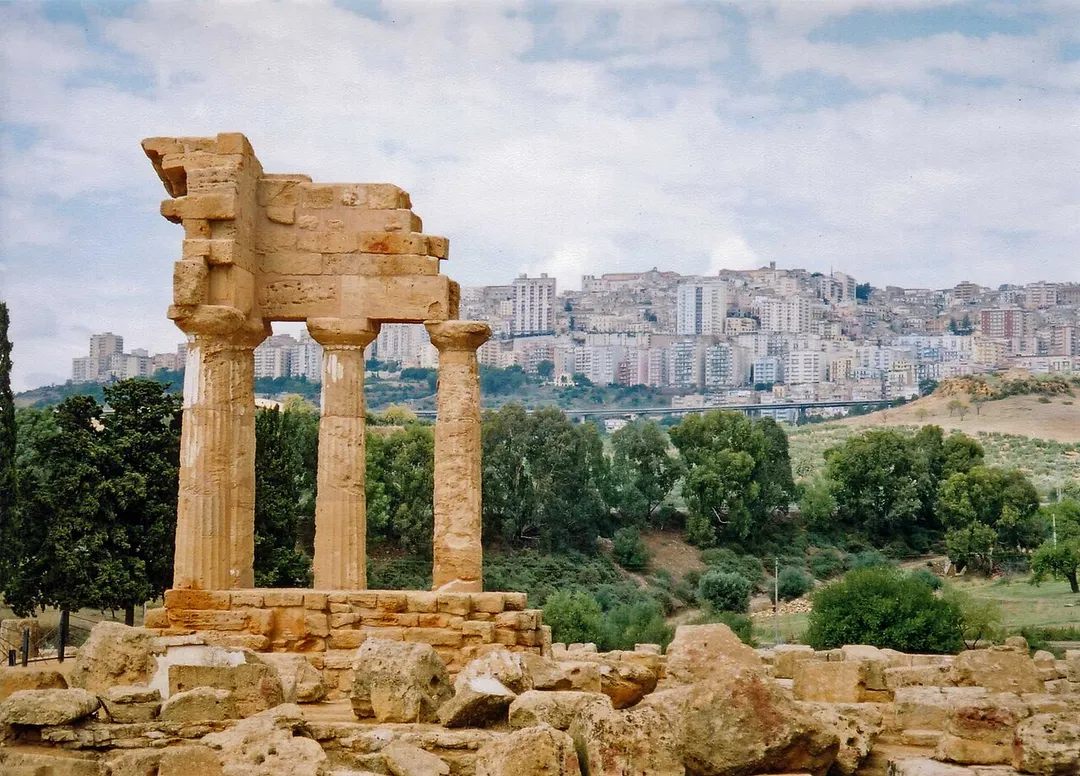 The Temple of Gemini and the modern city in the background.