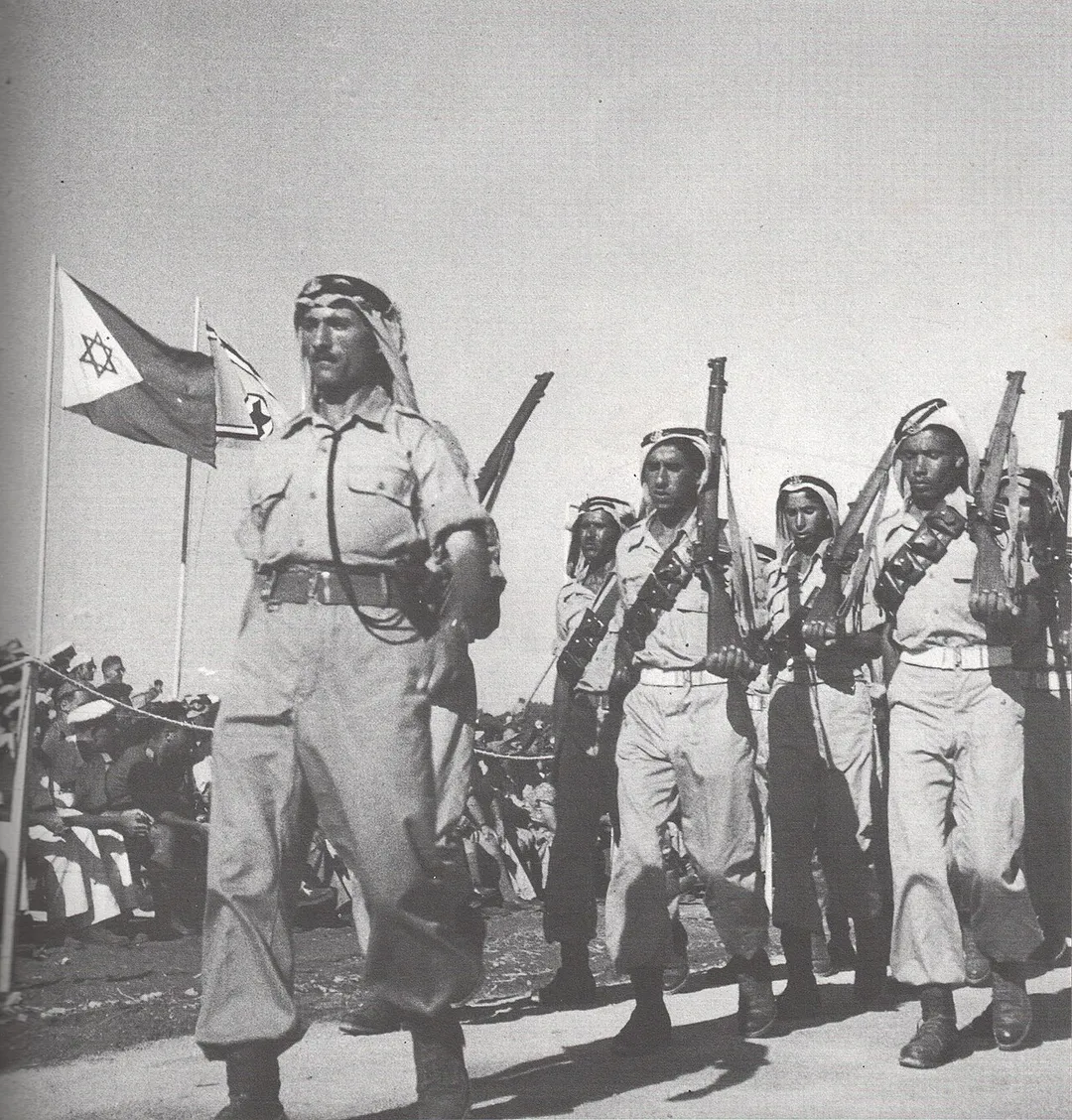 Bedouin IDF soldiers of Rumat al-Heib (عرب الهيب) during a military parade in Tel-Aviv in June 1949.