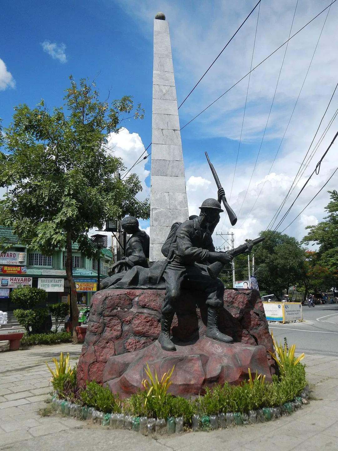 Rare, raw, unedited and original photos of Angono Second World War Memorial and Heritage statues at Crossing, Junction[1] Coordinates:   14°31'56"N   121°9'8"E --Barangay San Isidro[2] Coordinates:   14°32'22"N   121°9'43"E --Angono, Rizal[3]  is a first class urban municipality in the province of Rizal, Philippines. It is known as "Arts Capital of the Philippines", and located 30 kilometres (19 mi) east of Manila. According to the latest census of August 1, 2007, it has a population of 97,209 inhabitants (or 4.26% of Rizal province's total population of 2,284,046) in 15,740 households.Website ---------[N.B. June 2, Sunday day, 2013 Photography of Angono, Rizal[4],  Binangonan, Rizal[5]  and Cardona, Rizal[6]: 80% cloudy and 20% sunny weather using my Nikon AW 100 waterproof shockproof camera. From Bulacan at 10:45 a.m., I took photo at 12:25 pm of Goldenhills Jewelry of Antonio Z. Atienza, Jr.[7] in Robinsons Ortigas; and reached Angono, Rizal junction, crossing at 2:06 pm, then took photos of Binangonan Municipal Hall at 2:44 pm; I finished Cardona, Rizal photography at 5:17 p.m., and arrived at Bulacan at 9:30 pm after 3+ hours of travel by bus, and started uploading via slow internet at 9:50 pm - I hereby certify that these rarest, raw, original and unedited photos are exclusive for Commons and Wikipedia never uploaded in any Internet or any site, and for the public domain without any condition.]