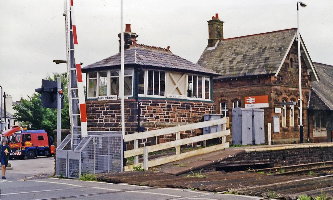 Askam station, signalbox and crossing, 1998.
View southward, towards Barrow and Carnforth: ex-Furness Railway, Carnforth - Barrow -Whitehaven secondary main line.