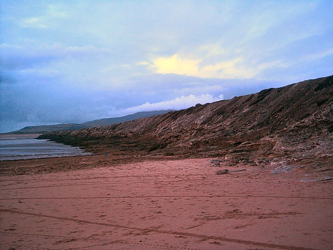 The more gradual southern side of Askam pier. Picture facing away from the village, taken on the beach near the start of the pier.