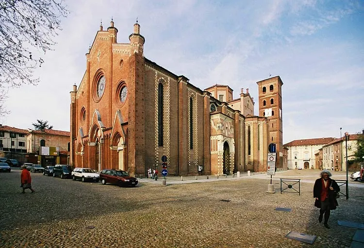 A photograph of the fourteenth-century gothic cathedral of Asti, Italy seen from the (ecclesiastical) south west. (Olympus OM-4, Sigma 14mm lens; image cropped all round.)