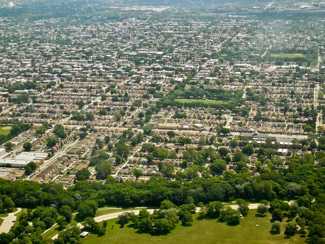 Aerial photograph of the Auburn Gresham neighborhood of Chicago, taken from a commercial airplane. The view looks toward the east, with Dan Ryan Woods in the foreground.
Interactive map with some landmarks highlighted