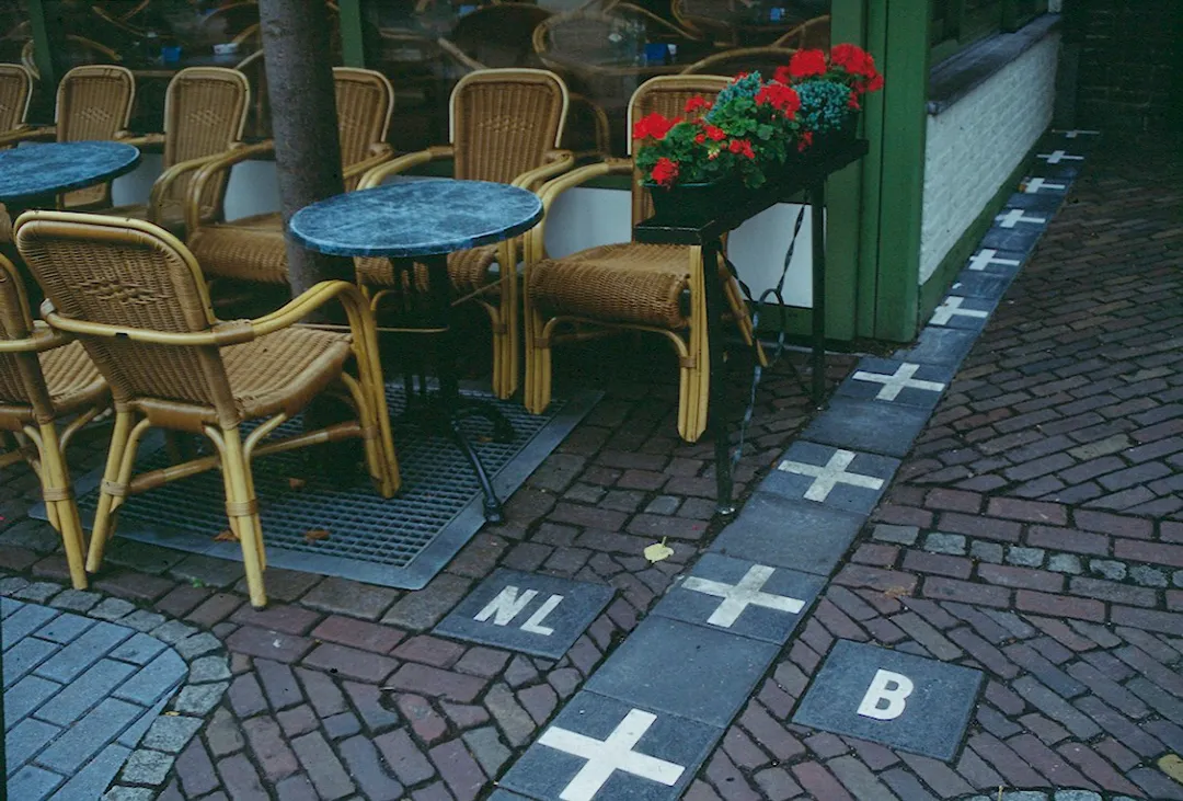 Café in Baarle-Nassau (Netherlands), on the border with Belgium. The border is marked on the ground (N119/N260).