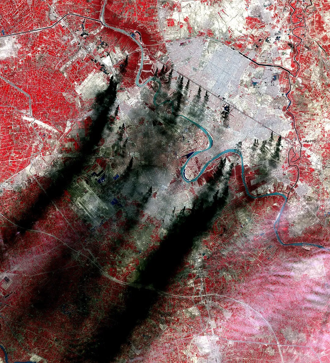 The plumes, which originate along major roads and canals, are believed to be burning pools of oil from pipelines. The plumes, which blanket large sections of the city of approximately 5 million, are creating an environmental health hazard for residents of the city and surrounding regions. The image covers an area of 44 by 46 kilometers (27 by 29 miles) at a spatial resolution of 15 meters (49.2 feet). ASTER's broad spectral coverage and high spectral resolution are ideally suited for monitoring dynamic environmental conditions caused by natural and human-induced factors. The image was acquired March 31, 2003 and is located at 33.3 degrees north latitude and 44.4 degrees east longitude.