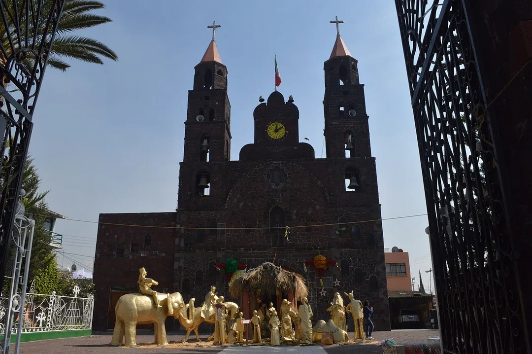 View of the parish church of  Santiago Zapotitlan in the Tláhuac borough of Mexico City with large nativity scene in front
