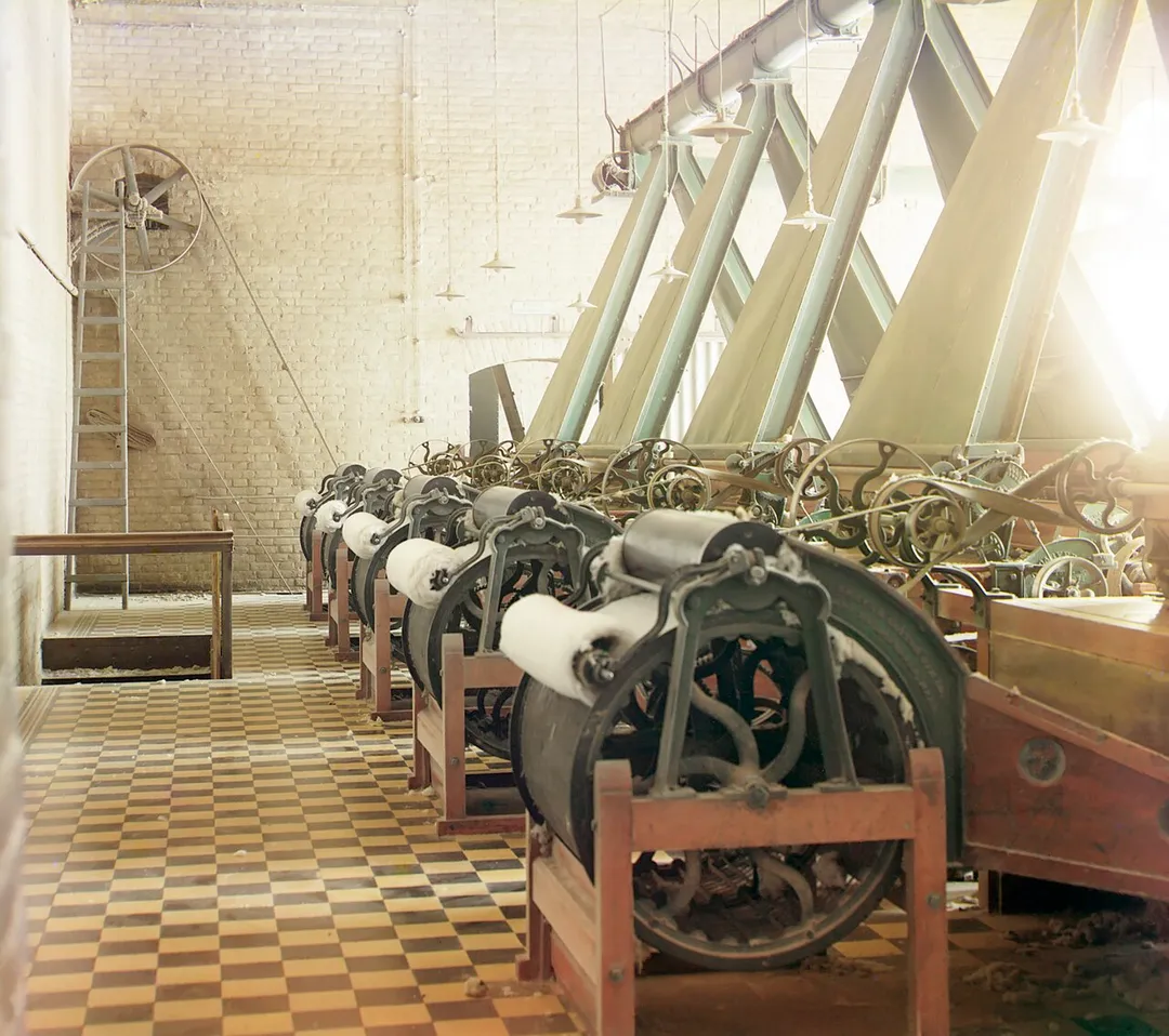 Original Description: Cotton textile mill interior with machines producing cotton thread, in Bayram-Ali (Bayramaly).