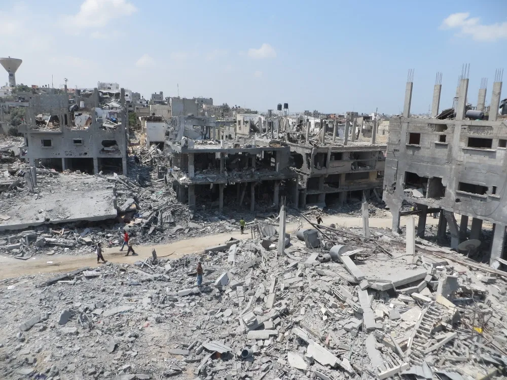 Ruins in Beit Hanoun, August 2014
Photos of the town of Beit Hanoun in the northern Gaza Strip. Taken by Muhammad Sabah, B’Tselem field researcher in Gaza, on 5 August 2014, in the course of the ceasefire. Whole sections of Beit Hanoun have been demolished, making it one of the hardest hit communities in the recent offensive, along with Gaza City, Beit Lahiya, Khuza’ah and Rafah.
In the course of the fighting B’Tselem collected several testimonies from Beit Hanoun residents. All but one of the testimonies were taken by phone by B’Tselem field researchers in the West Bank:
Ambulance driver Rami 'Ali recounts attacks that killed paramedic 'Aaed al-Bura'i and injured team sent to rescue him, both despite coordination with Red Crescent Read testimony
Suhair Shabat describes mortal fear of bombing, leading her to take her children and flee Beit Hanoun Read testimony
Shadi Taleb tells of seeing Abu Jarad family home shelled, leaving 8 dead; recounts constantly fleeing with his family for fear of bombings Read testimony

Muhammad Hamad, 75, resident of Beit Hanun, relates how bombing killed his family members in their yard Read testimony