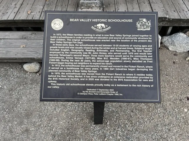 The Bear Valley Springs Historic Schoolhouse descriptive marker for the schoolhouse behind the Bear Valley Springs Country Market.