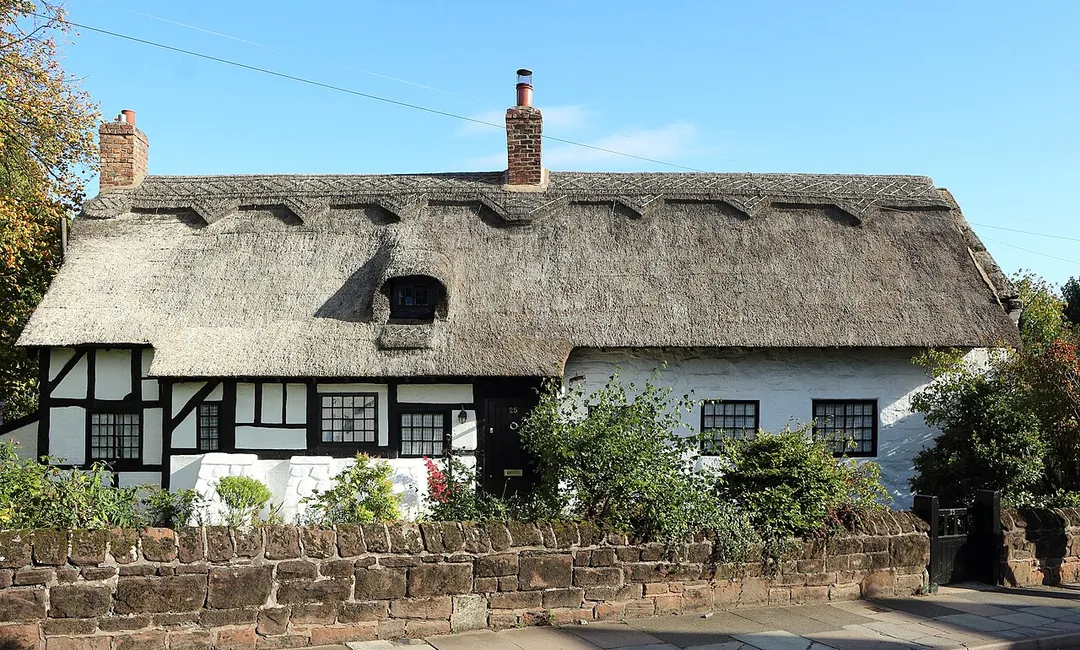 Grade II listed 17th century thatched cottage on The Village, Bebington.