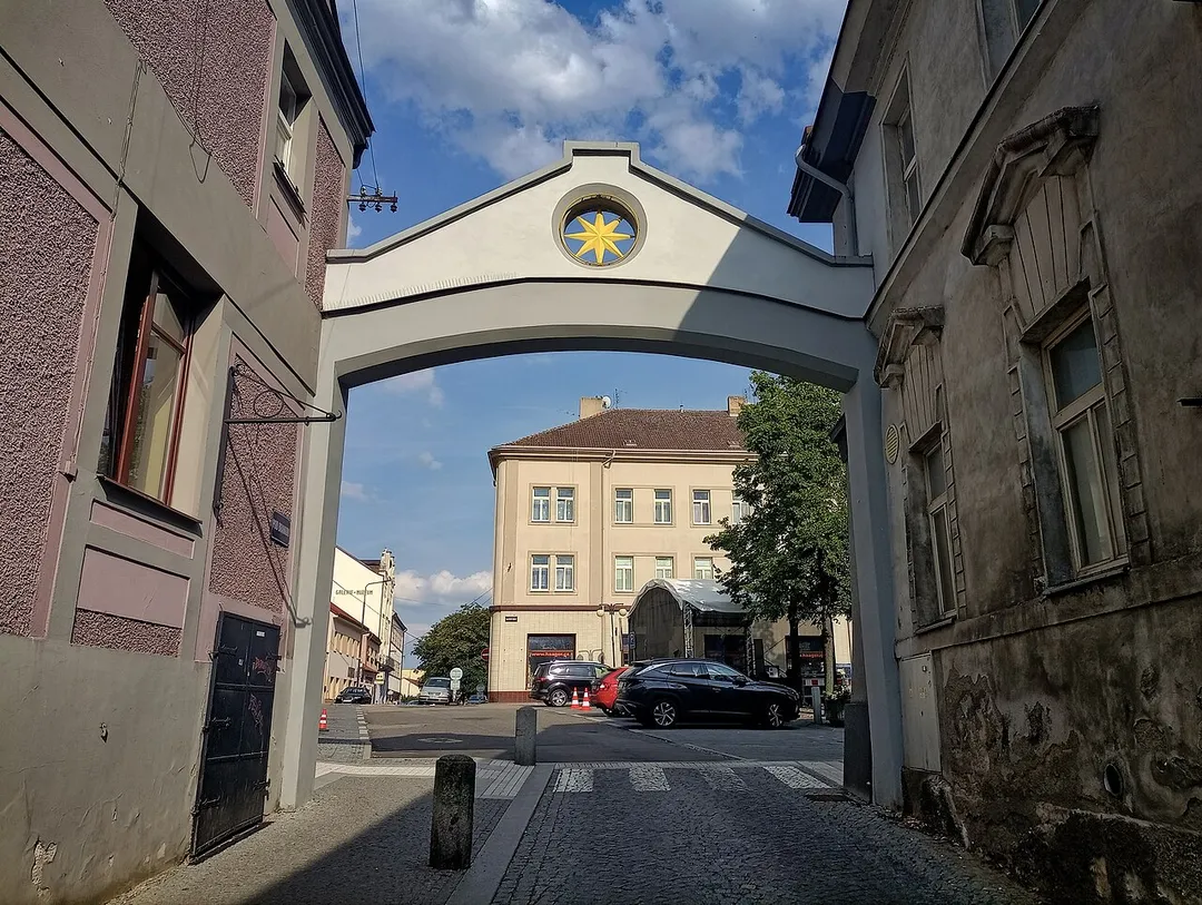 Town gate with a star on Masaryk Square, Benešov u Prahy, Benešov District, Central Bohemian Region, Czech Republic.