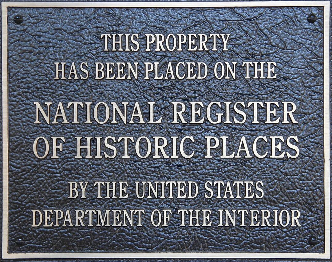 Plaque declaring "this property has been placed on the National Register of Historic Places by the United States Department of the Interior"