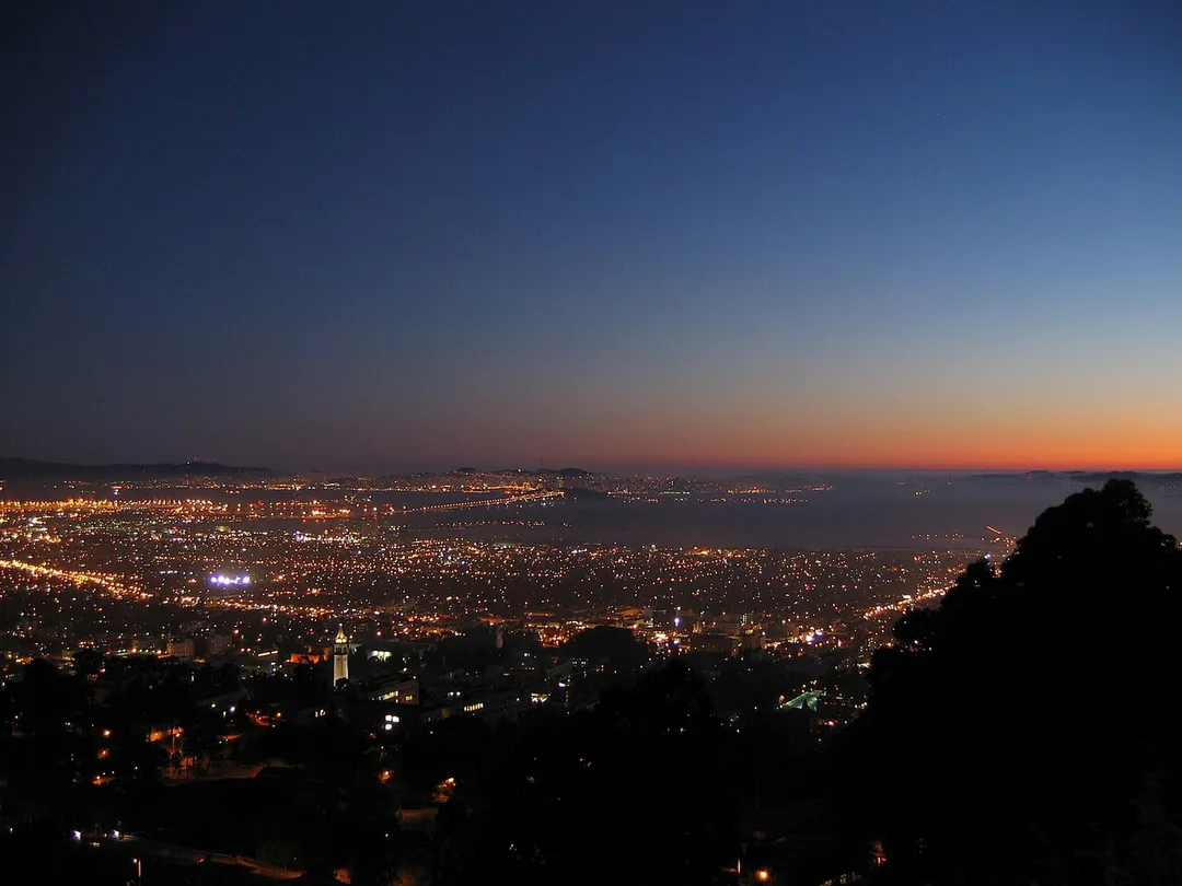 Berkeley, San Francisco Bay, and San Francisco at nightfall — view from the Berkeley Hills.