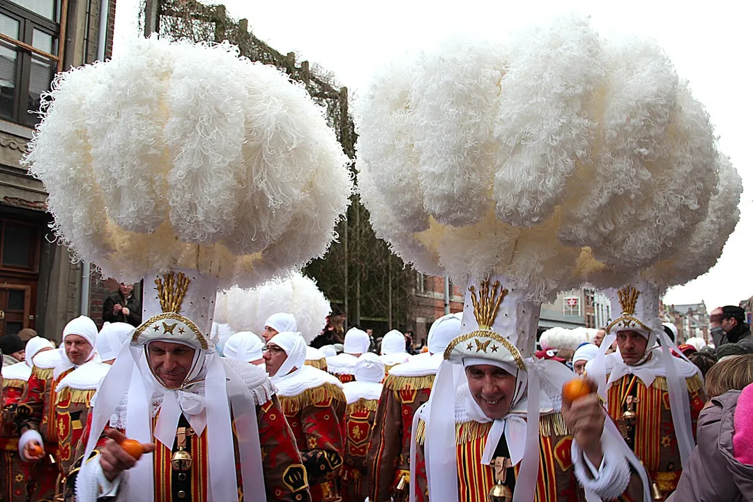 Binche, the Gilles wearing their hat with ostrich feathers on Shrove Tuesday.