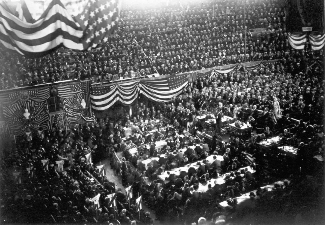 1880 Republican National Convention at Chicago, Illinois.


A view inside the Interstate Exposition Building (known as the "Glass Palace") during the convention; James Garfield (center, right) is on the podium, waiting to speak.