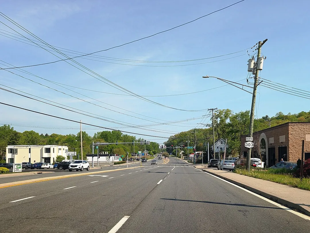 Photo of northbound New York State Route 303 in the hamlet of Blauvelt within Orangetown, New York. Photo taken looking north between Hickory Street and Erie Street.