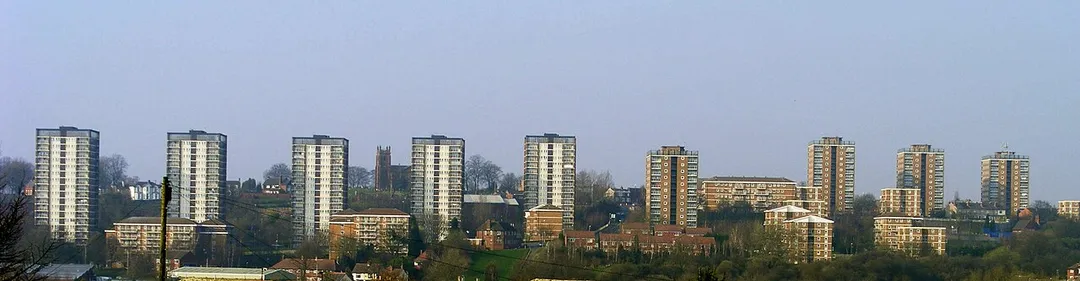 The en:Brierley Hill flats.
Cropped and reduced haze with curves tool in the GIMP.