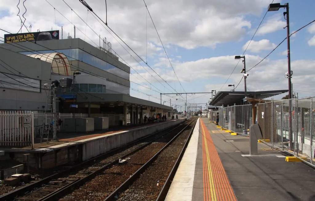 Looking in the down direction along the broad gauge suburban platforms 1 and 2 at Broadmeadows railway station, Melbourne. Used by Metro Trains Melbourne services to/from Craigieburn, as well as V/Line services to Shepparton and Seymour.