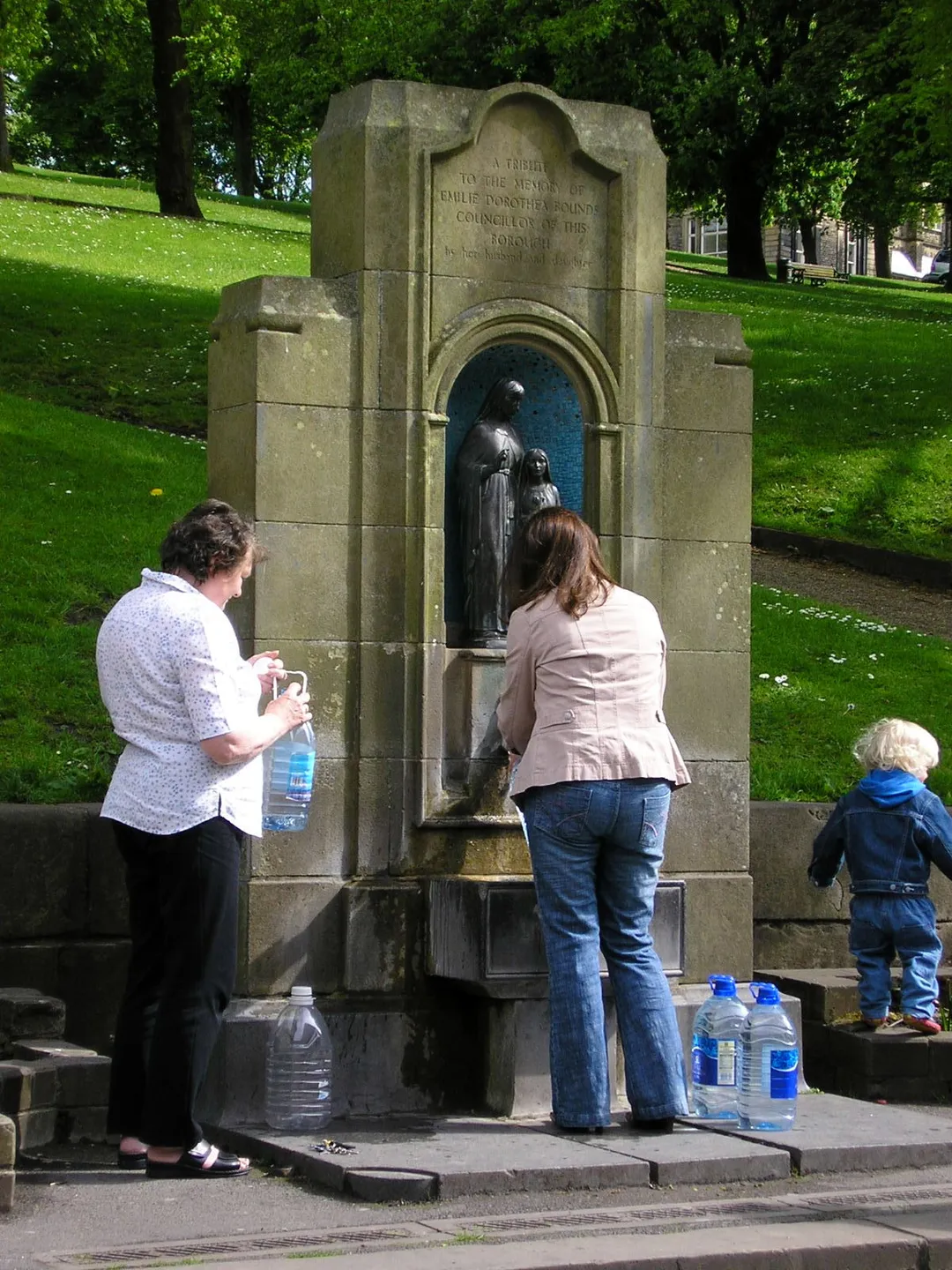 St Ann's Well in The Crescent in the spa town of Buxton, Derbyshire.
When he had filled a bottle here, our son asked "how do I turn it off?". It was pointed out to him that the water had been running continuously since the end of the last Ice Age at least and that there was no need to turn it off.

Most of the water from this spring is bottled and sold commercially but there may well be an ancient endowment that requires it to be available free of charge. Certainly there is a continuous stream of people filling their bottles here - another pic.