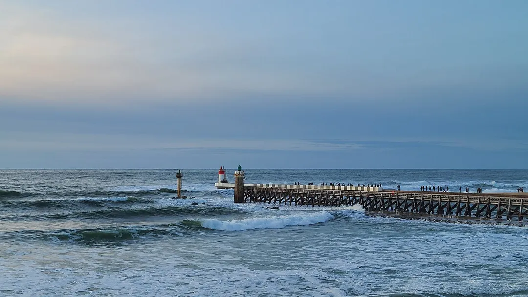 Capbreton lighthouse and Estacade seen from Estacade beach