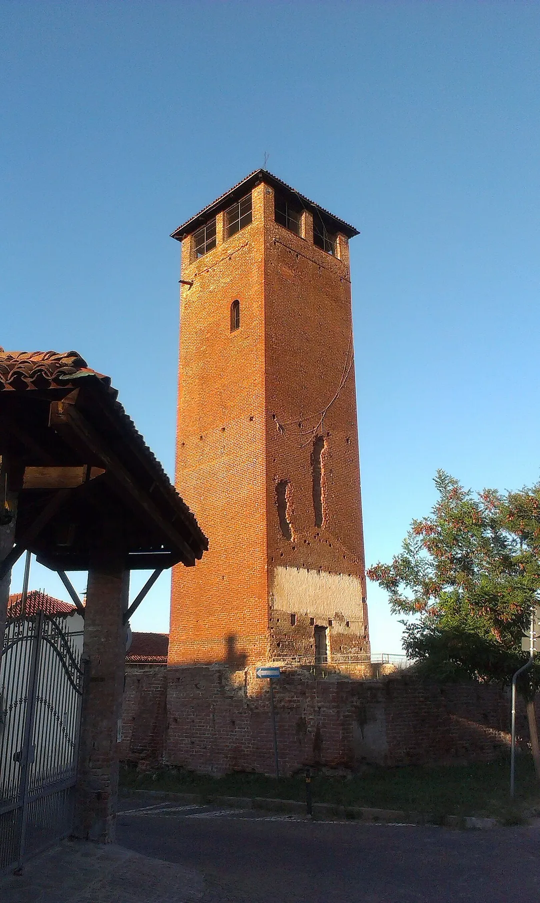 Medieval tower in city of Carignano, near Turin, Italy.