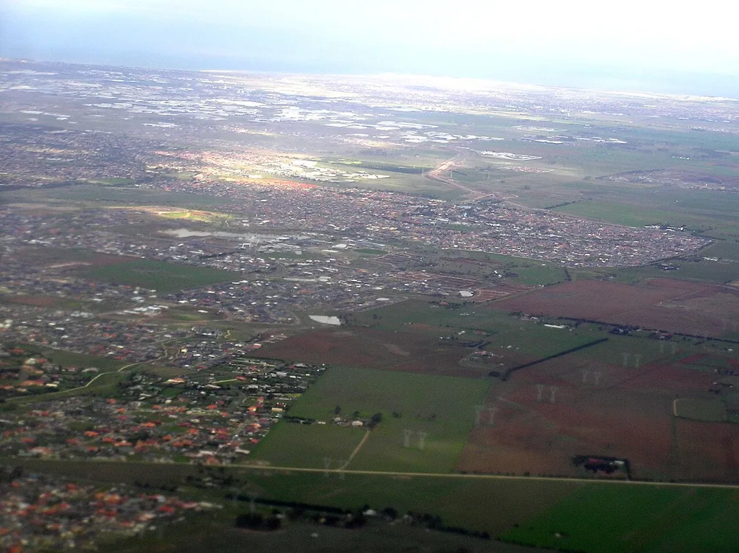 Aerial photo of the whole of Caroline Springs Victoria Australia from north.  Lake Caroline is visible
