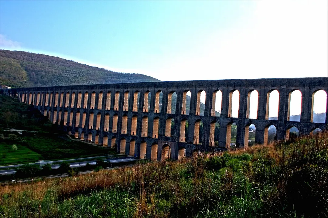 The Carolino Aqueduct and the Bridges of the Maddaloni Valley were built not only to feed the numerous fountains and falls of the Royal Palace of Caserta but most of all to guarantee the new Capital’s water supply and to provide the essential motivity for the silk factories in the near San Leucio .

Vanvitelli’s Masterpiece was commissioned in the March 1753 by king Charles III of the Bourbon dynasty to create the extraordinary jet fountains in the gardens of the Royal Palace of  Caserta (Italy).