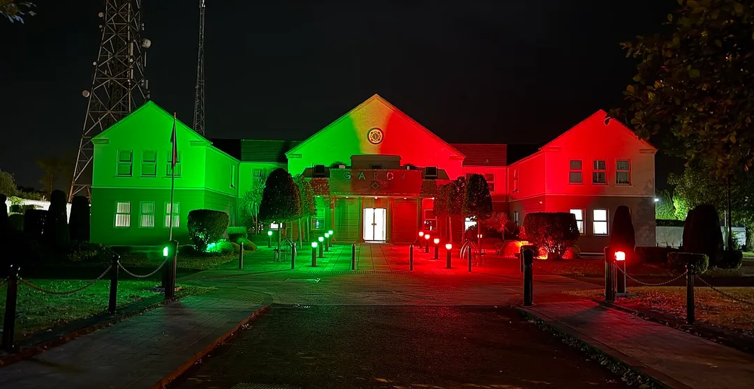 Castlebar Garda station illuminated in the Mayo colours following Mayo's win of the 2026 All-Ireland Senior Mens Football Championship