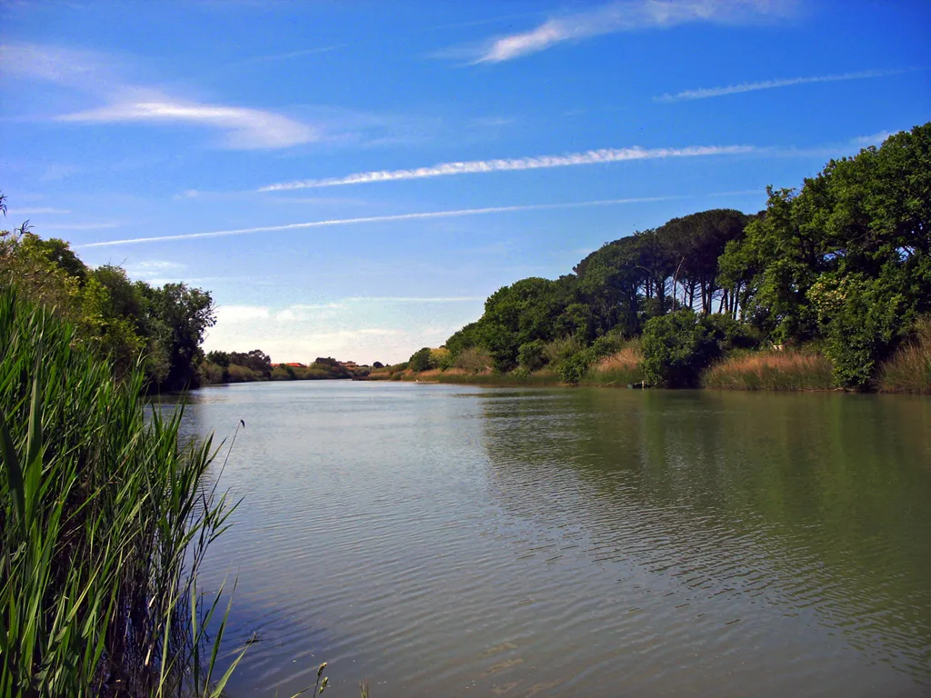 View of Cecina river (Cecina, Tuscany, Italy) near its mouth (Marina di Cecina).
