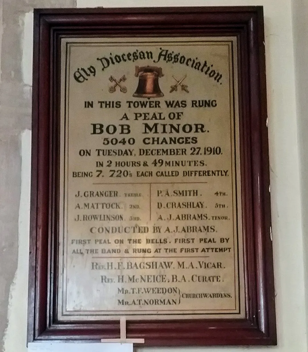 Plaque commemorating the ringing of a peal of Bob Minor in 1910 in SS Peter and Paul parish church, Chatteris, Cambridgeshire