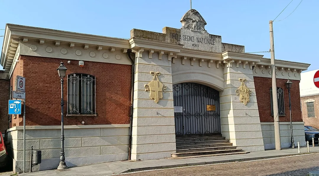 Shooting gallery building facade in Chieri, Italy