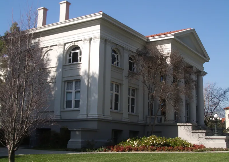 The Carnegie Library, located at the west end of Marston Quadrangle at Pomona College. The library houses the college's politics and economics departments.