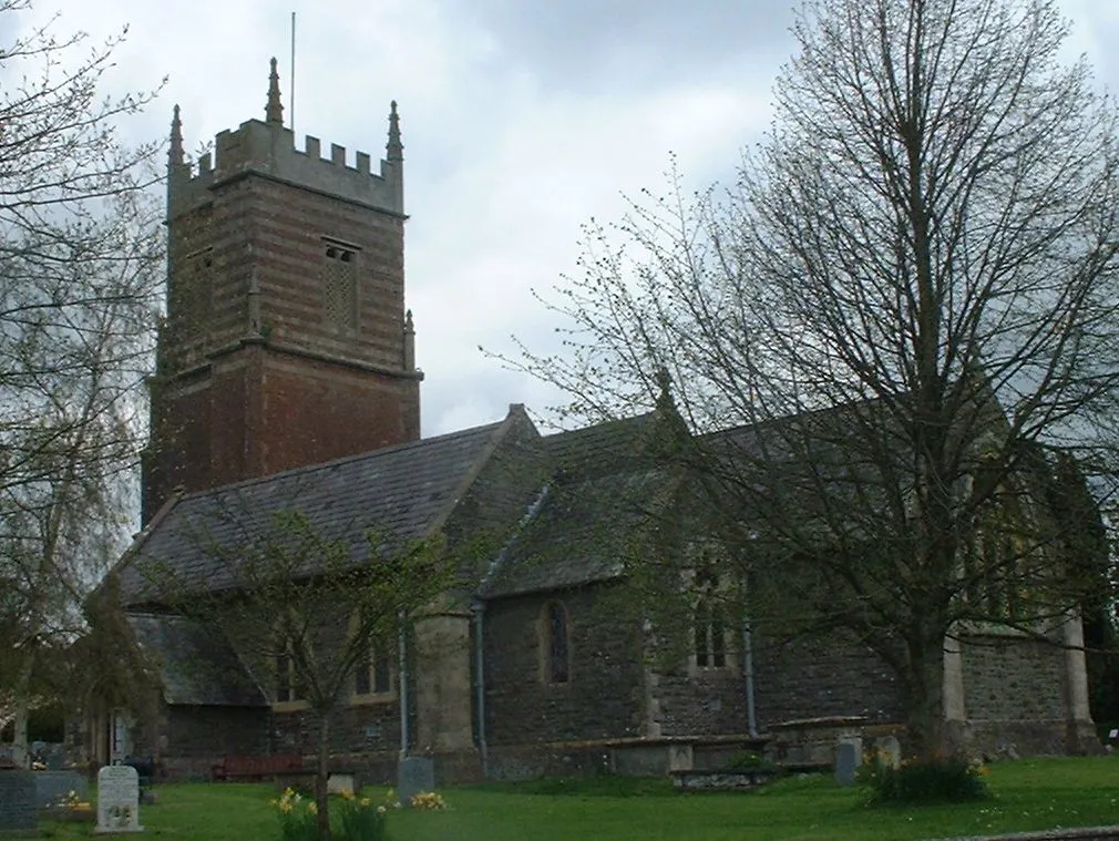 Church at Clutton Taken by Rod Ward 27th April 2006.  The church is dedicated to St Augustine of Hippo. It dates from around 1190, but has had several major restorations. The tower is made of red sandstone with diagonal buttresses ending in pinnacles and probably dates from 1726. The tower contains two bells dating from 1734, made by Thomas Bilbie of the Bilbie family. The church is a Grade II* listed building. Two railed tomb enclosures within the Broadribb family plot are also listed as Grade II, as are a group of three Broadribb and Purnell monuments. The church is currently under a small amount of renovation.