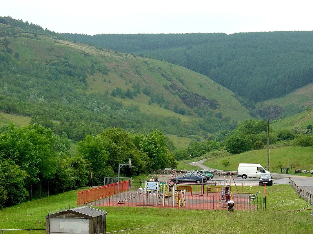 Head of Clydach Vale, Rhondda, showing greening of surrounding slagheaps and new children's playground