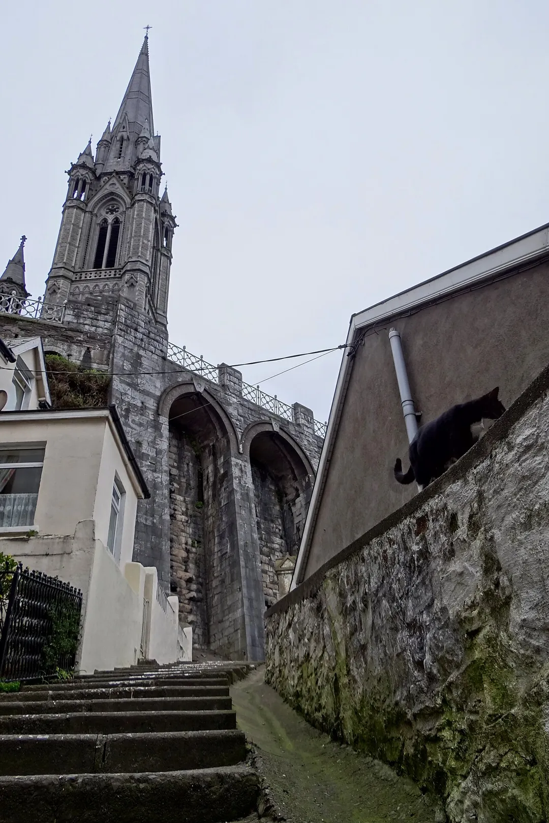 St. Colman's Cathedral as seen when approached directly from the town centre along a steep alleyway known locally as "The Rock".