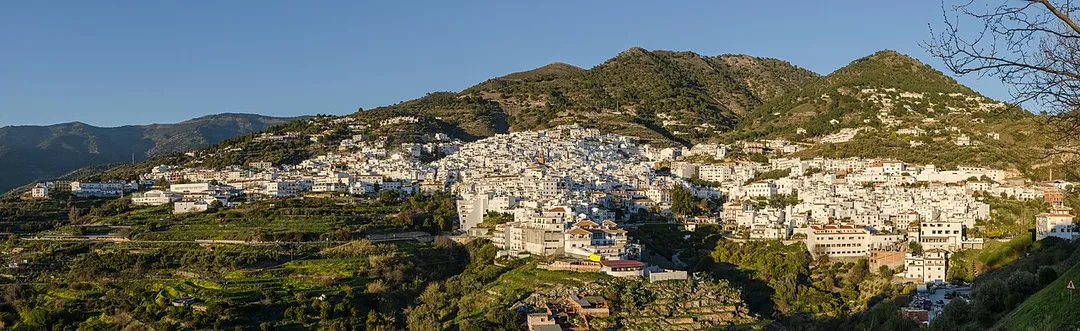 Cómpeta - panoramic view at golden hour shortly before sunset.