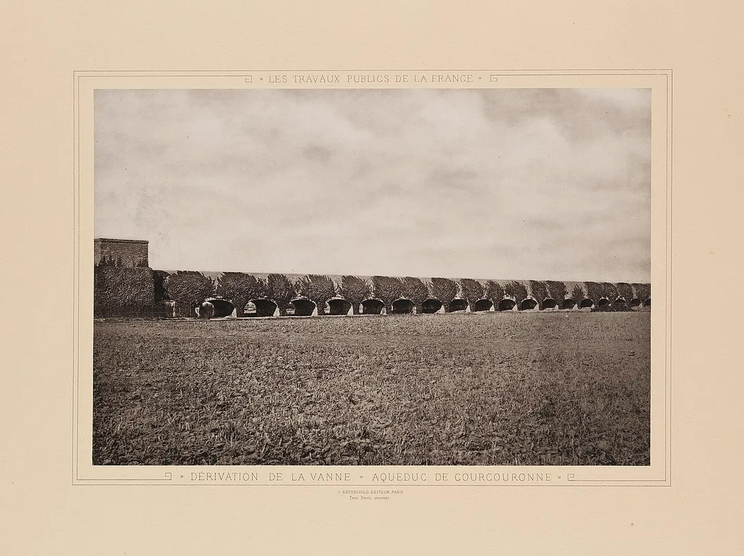 Title: Derivation de la Vanne. Aqueduc de Courcouronne
Alternative Title: Derivation of the Vanne. Coucouronne Aqueduct
Creator: Unknown
Date: 1883
Part Of: Les Travaux Publics de la France, Tome Troisieme: Rivieres et Canaux, Eaux des Villes - Irrigation et Assainissement des Terres
Place: Courcouronnes, Essonne, Ile-de-France, France
Physical Description: 1 photographic print: collotype; 26 x 35 cm on 40 x 56 cm mount
File: vault_folio_2_ta71_a4_1883_3_40_opt.jpg
Rights: Please cite Southern Methodist University, Central University Libraries, DeGolyer Library when 
using this image file. A high-quality version of this file may be obtained for a fee by contacting 
degolyer@smu.edu.

For more information, see: digitalcollections.smu.edu/cdm/ref/collection/eaa/id/918