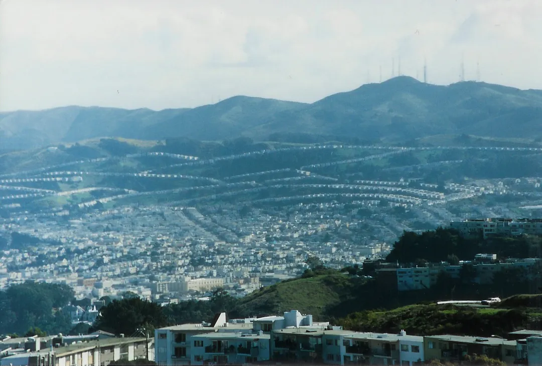 Part of Daly City, California. Background: San Bruno Mountain; in the valley: San Francisco neighborhood Crocker Amazon.