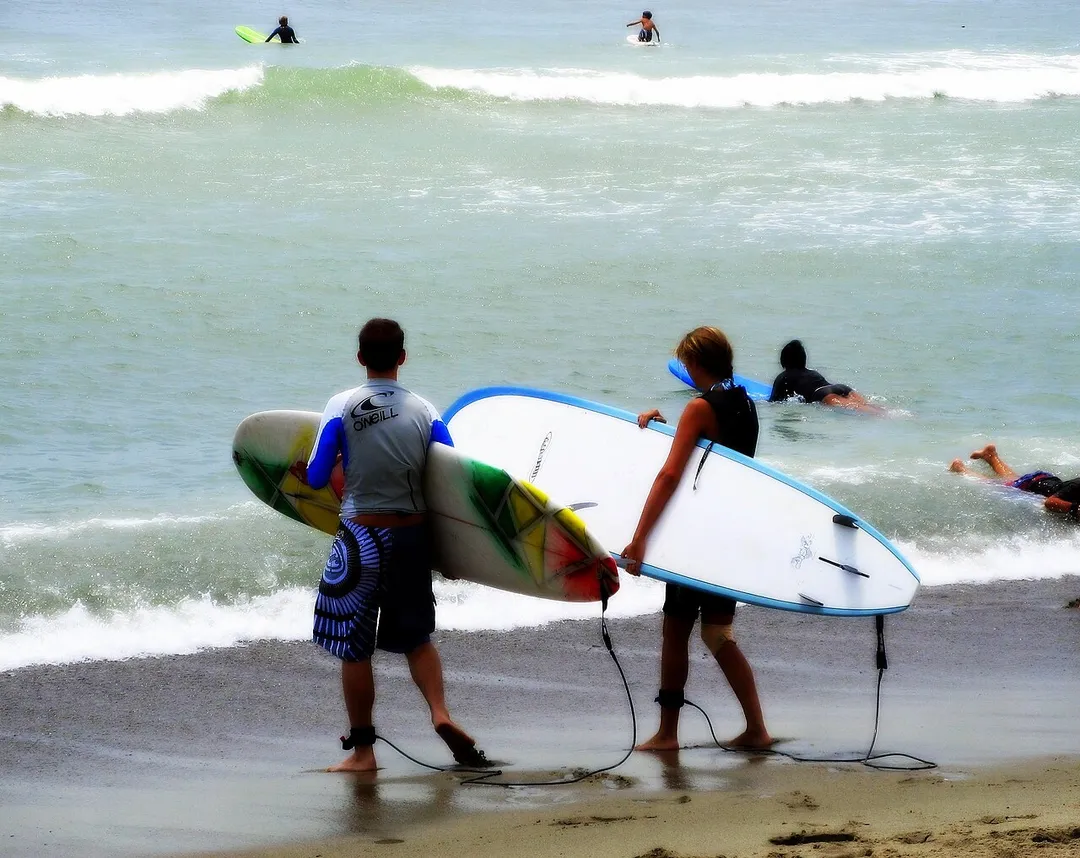 Surfers at Doheny State Beach during Summer.