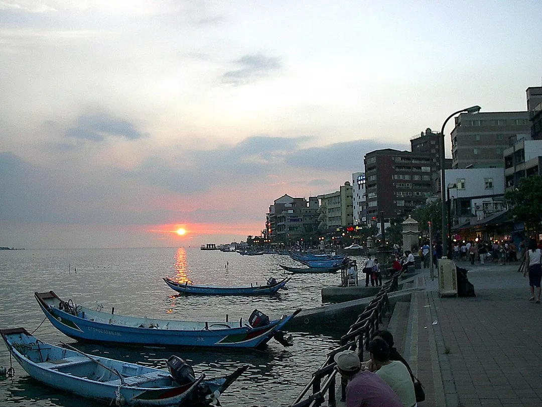Tamsui (Fresh Water) is located north of Taipei City, within Taipei County. Waterfront at sunset. Danshui Township, Taiwan.