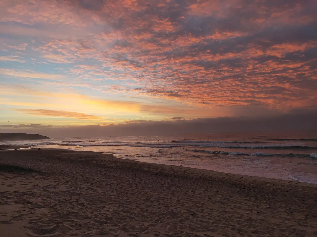 Sunrise at Dee Why beach, Sydney in April 2019 on a slightly cloudy day