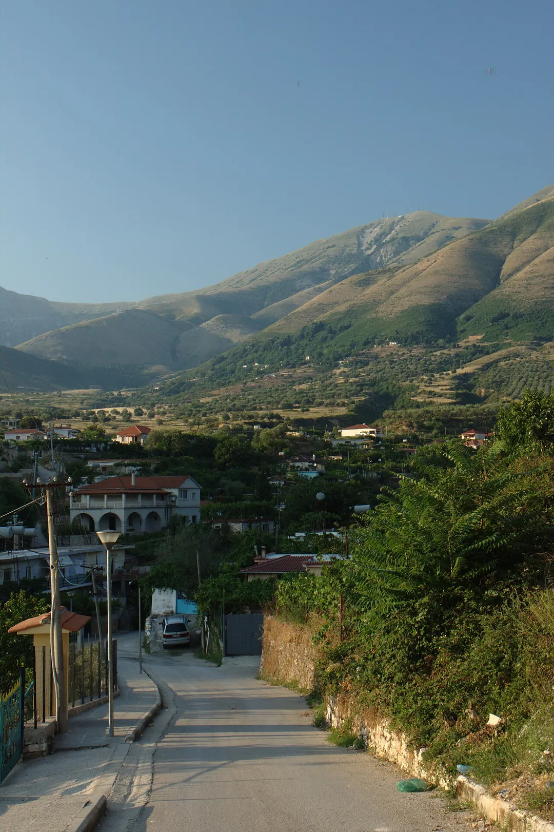 A road from the town of Delvinë north to the Sopot hills, Albania