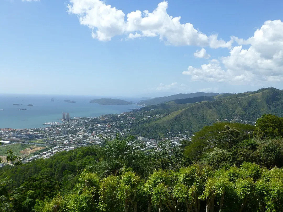 Western Main Road winding through Westmoorings, Bayshore and Glencoe. Background: Five Islands, Point Gourde. Diego Martin, Trinidad and Tobago.
