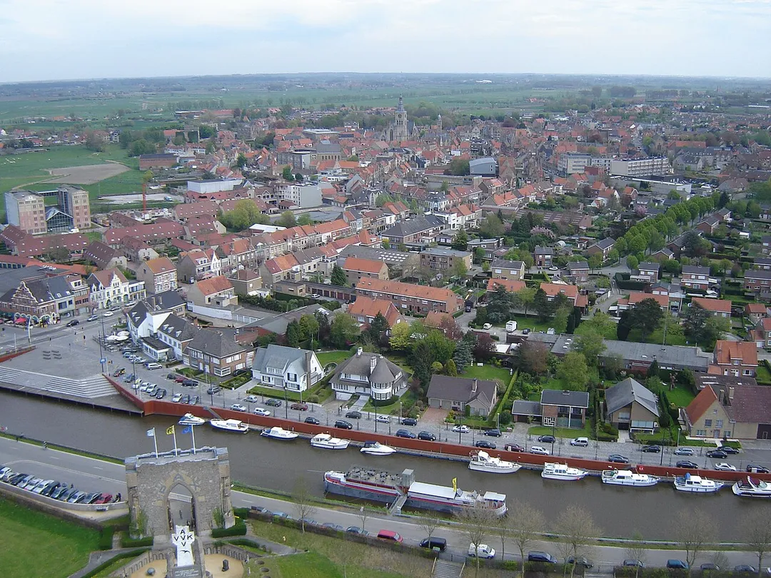 View of the city of Diksmuide along the river Yzer, seen from the IJzertoren (Yzer Tower). Diksmuide, West Flanders, Belgium