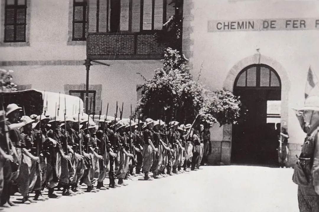 Members of the Italian Camicie Nere (Blackshirts) taking possession of the railway station at Dire Dawa, Ethiopia, in May 1936. The Djibouti-Dire Dawa-Addis Ababa Railway line was owned by the Franco-Ethiopian Railway Company (Chemin de fer franco-éthiopien).